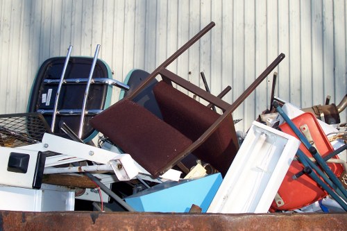 Professionals clearing a flat in Seven Sisters