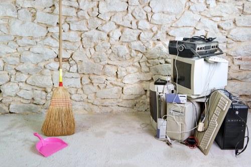 Professional waste clearance team managing construction debris